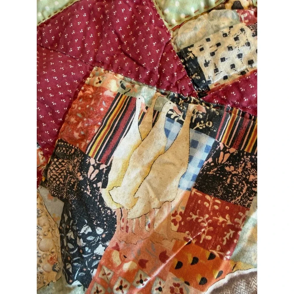 Small hand sewn quilt. Cutter